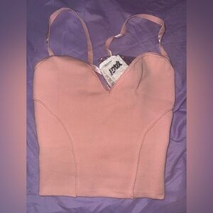 KURA II LIGHT PINK HALTER TIE
Yagi wrld